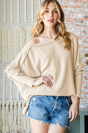 REBORN J EXPOSED SEAM LANTERN SLEEVE TOP - Evolve Elegance Boutique