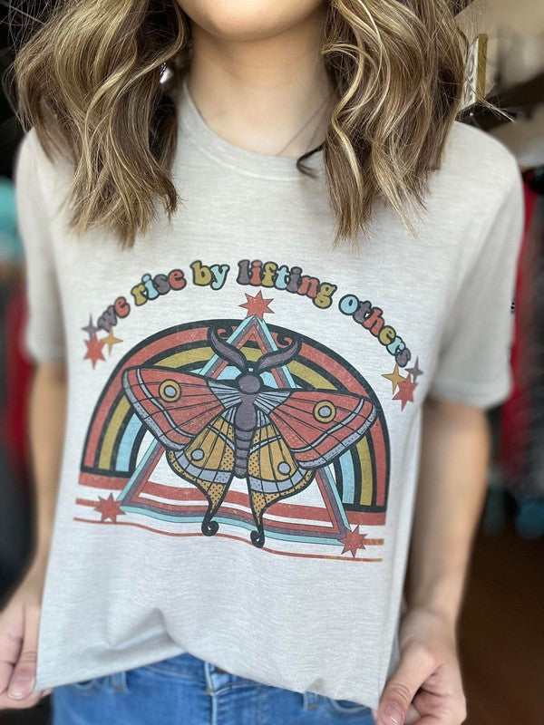 WE RISE BY LIFTING OTHERS TEE - Evolve Elegance Boutique