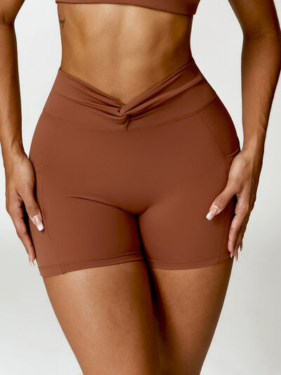 TWISTED HIGH WAIST ACTIVE SHORTS WITH POCKETS - Evolve Elegance Boutique