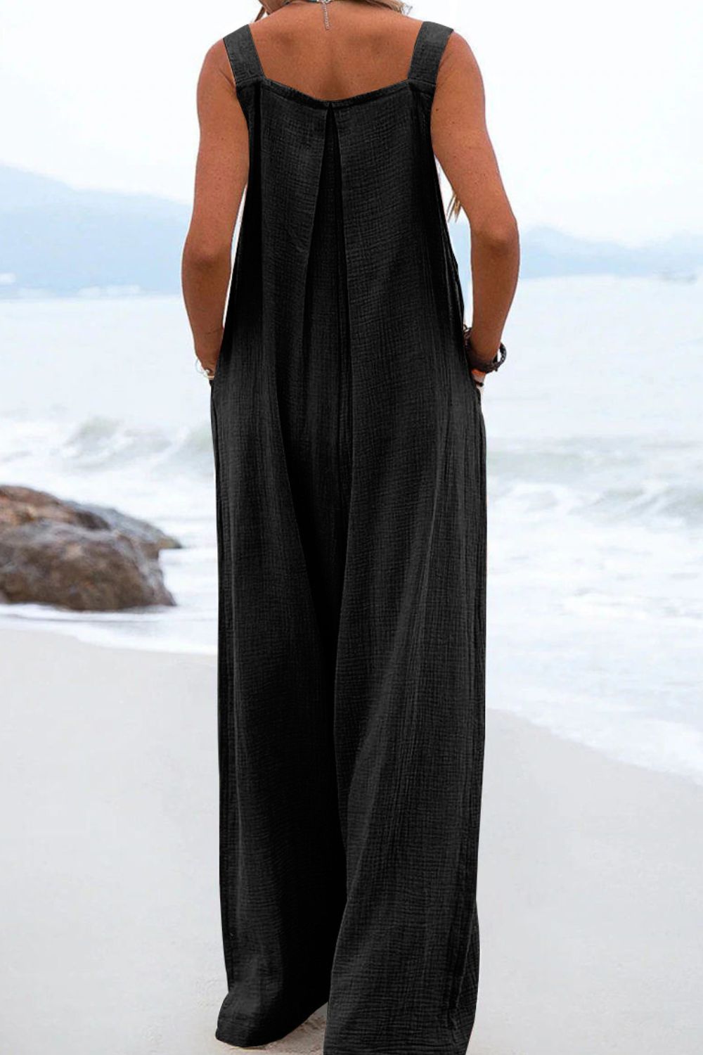 SLEEVELESS WIDE LEG JUMPSUIT WITH POCKETS - Evolve Elegance Boutique