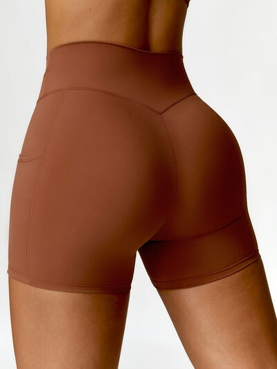 TWISTED HIGH WAIST ACTIVE SHORTS WITH POCKETS - Evolve Elegance Boutique