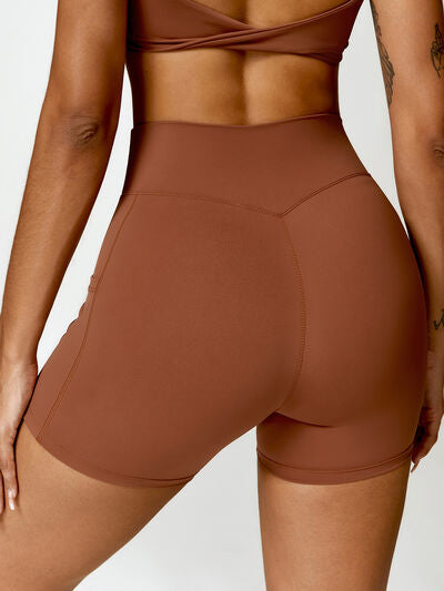 TWISTED HIGH WAIST ACTIVE SHORTS WITH POCKETS - Evolve Elegance Boutique