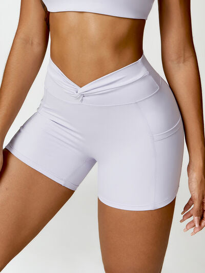 TWISTED HIGH WAIST ACTIVE SHORTS WITH POCKETS - Evolve Elegance Boutique