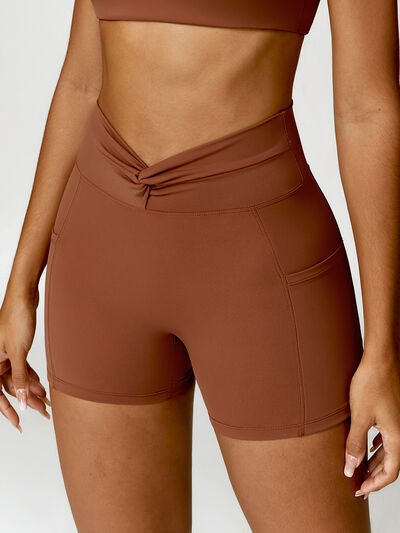 TWISTED HIGH WAIST ACTIVE SHORTS WITH POCKETS - Evolve Elegance Boutique